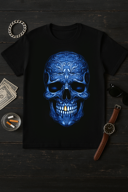 Black T-shirt with intricate blue skull design on rustic wood background