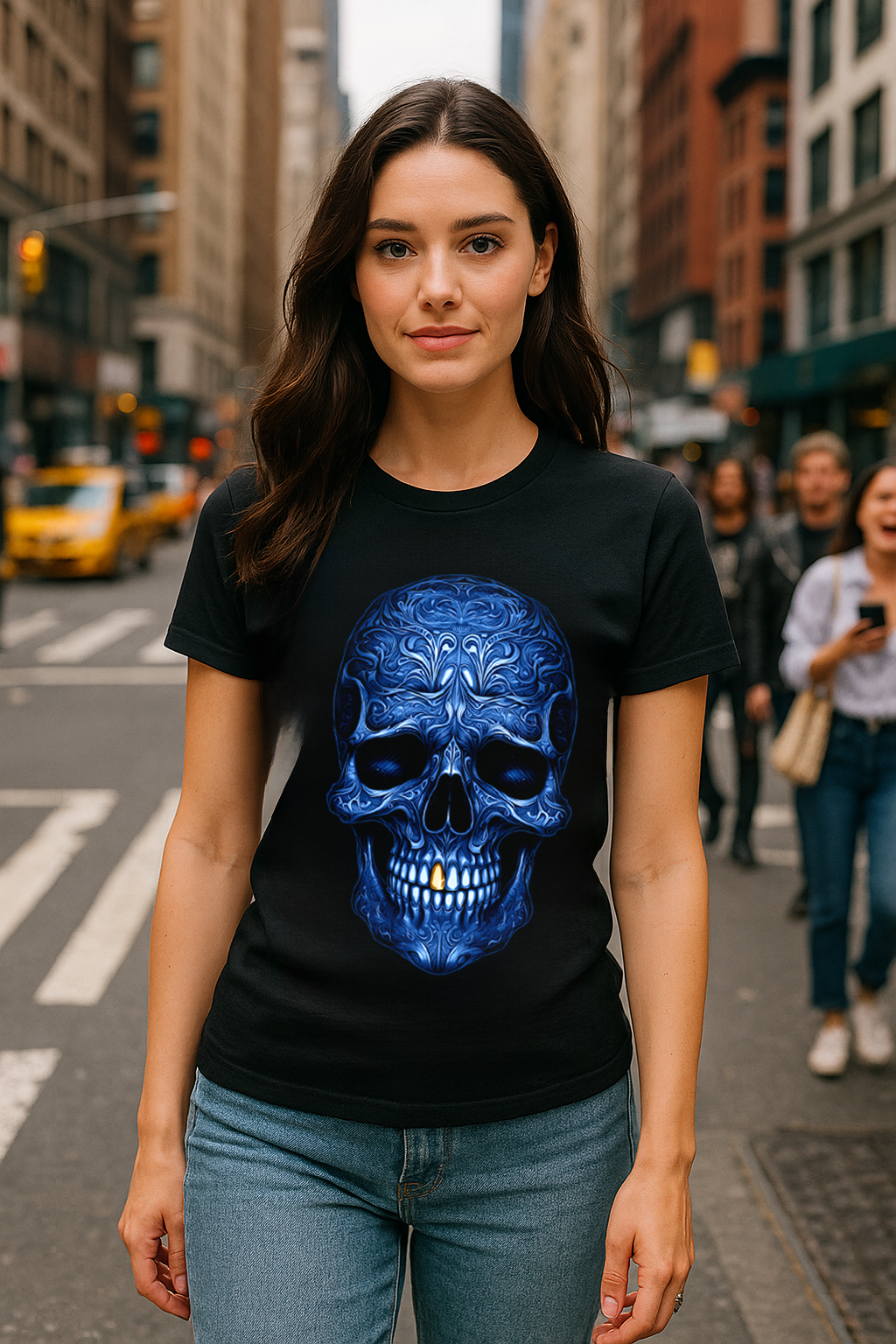 Young woman walking in NYC wearing black T-shirt with detailed blue skull design


